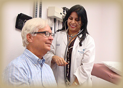 Dr Vijay Taunk, Primary Care Physician Dr Taunk with Patient